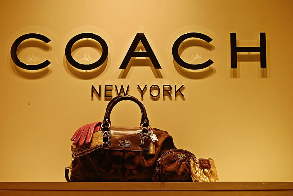 Tapestry, known for brands like Coach, Kate Spade, and Stuart Weitzman, and Capri, the parent company of Michael Kors, Versace, and Jimmy Choo, originally announced their merger in August 2023.