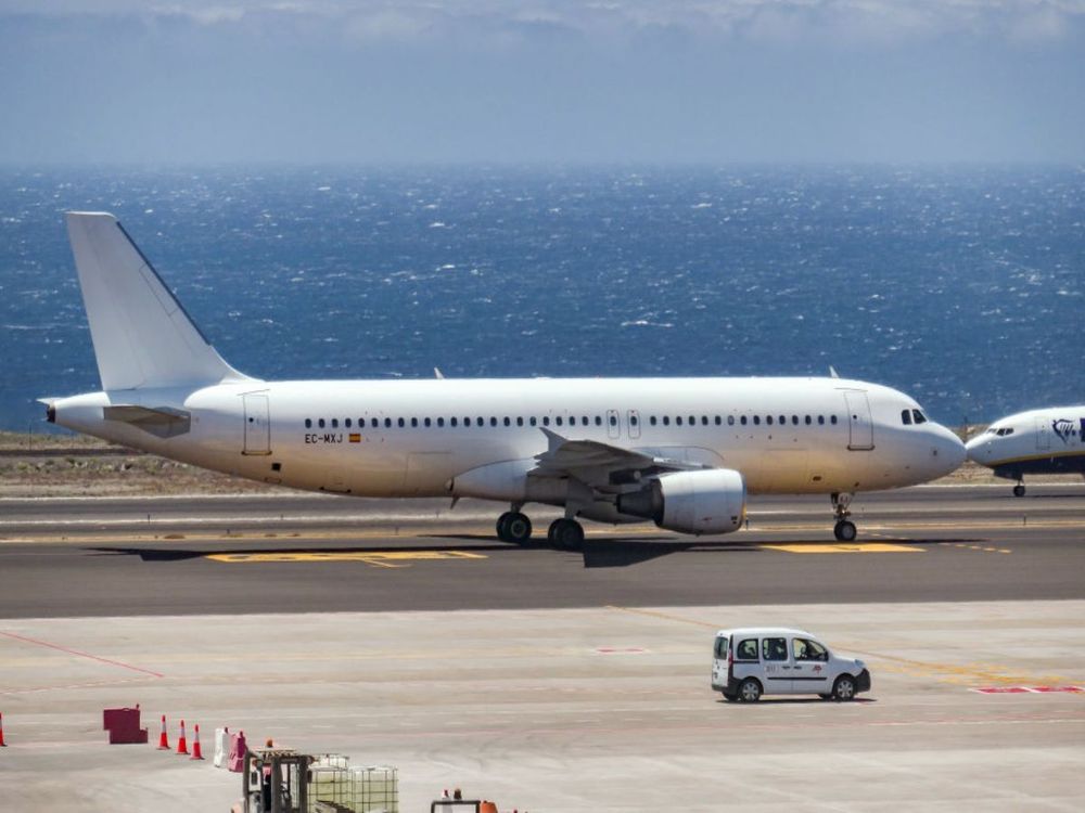 Blanked White Airbus A320 Airplane without logo or paint as seen landing and taxiing at Tenerife South TFS GCTS - Reina Sofia International Airport. (Photo by Nicolas Economou/NurPhoto via Getty Images)