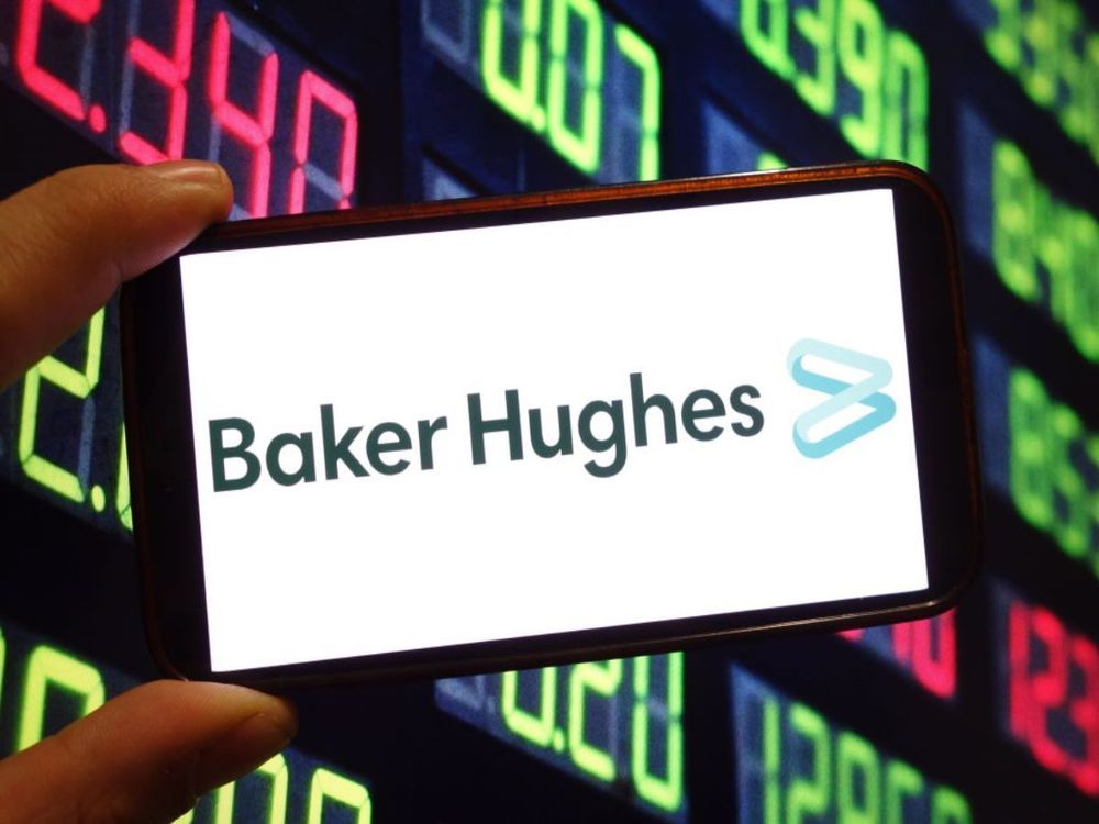 In this photo illustration, the Baker Hughes company logo is seen displayed on a smartphone screen. (Photo Illustration by Piotr Swat/SOPA Images/LightRocket via Getty Images)
