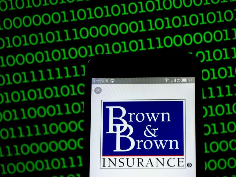 In this photo illustration, the Brown & Brown, Inc. company logo seen displayed on a smartphone. (Photo Illustration by Igor Golovniov/SOPA Images/LightRocket via Getty Images)