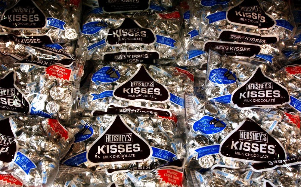 Bags of Hershey Kisses sit on a shelf at a store on August 7, 2002 in Hershey, Pennsylvania. Photo by Spencer Platt/Getty Images 