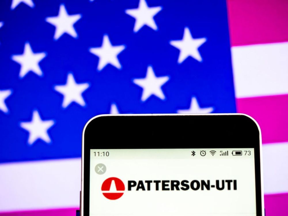 In this photo illustration, the Patterson-UTI Energy Company logo seen displayed on a smartphone. (Photo Illustration by Igor Golovniov/SOPA Images/LightRocket via Getty Images)