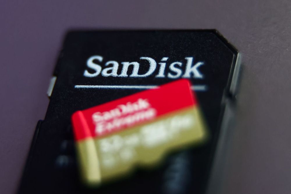 SanDisk adapter and microSD card are seen in this illustration photo taken in Krakow, Poland on January 30, 2023.
