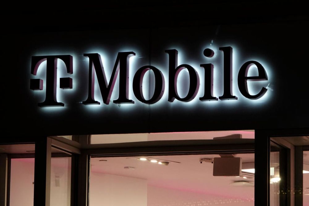 The T-Mobile logo is displayed outside of their store at Fashion Valley, an upscale shopping mall on December 13, 2024 in San Diego, California.