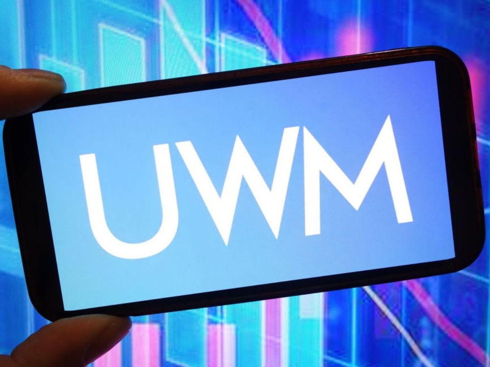 In this photo illustration, the UWM Holdings Corporation company logo is seen displayed on a smartphone screen. (Photo Illustration by Piotr Swat/SOPA Images/LightRocket via Getty Images)