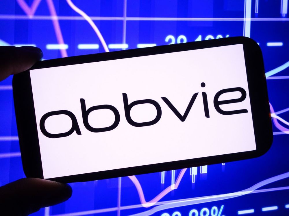 In this photo illustration, the AbbVie company logo is seen displayed on a smartphone screen. (Photo Illustration by Piotr Swat/SOPA Images/LightRocket via Getty Images)