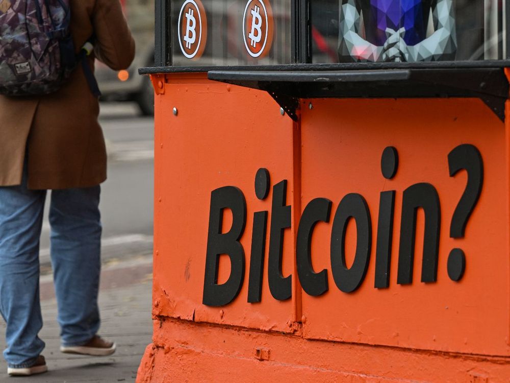 A Bitcoin inscription displayed outside a Bitcoin ATM, on November 20, 2024 in Krakow, Poland. (Photo by Artur Widak/NurPhoto via Getty Images)