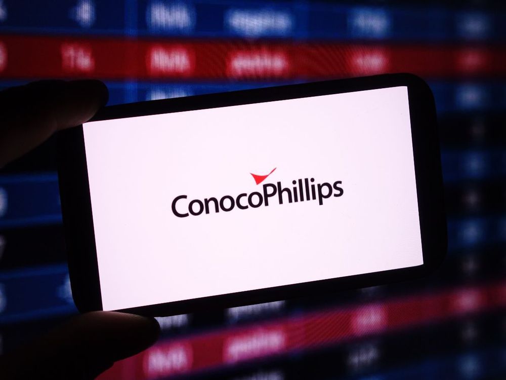 In this photo illustration, the ConocoPhillips company logo is seen displayed on a smartphone screen. (Photo Illustration by Piotr Swat/SOPA Images/LightRocket via Getty Images)