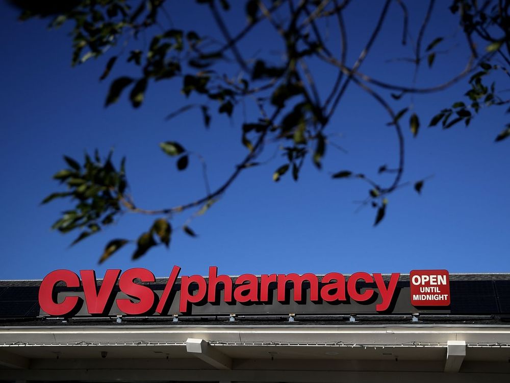 A sign is posted on the exterior of a CVS Pharmacy on Dec. 4, 2017 in San Anselmo, California. (Photo by Justin Sullivan/Getty Images)