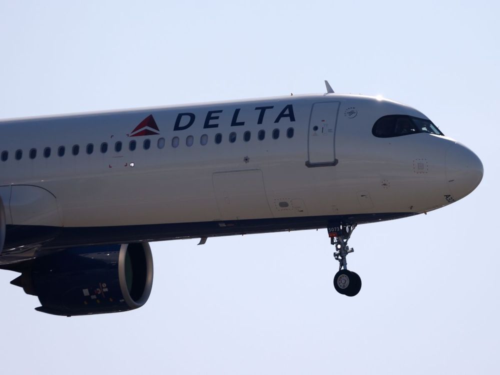 A Delta Airlines Airbus A321 approaches San Diego International Airport for a landing from Los Angeles on December 20, 2024 in San Diego, California. (Photo by Kevin Carter/Getty Images)