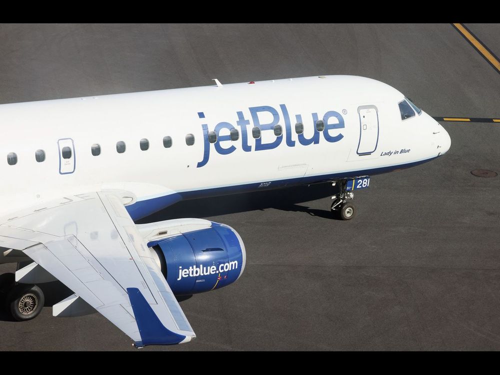 A JetBlue jet moves along the runway at Laguardia AIrport on November 10, 2022 in the Queens borough of New York City. (Photo by Bruce Bennett/Getty Images)