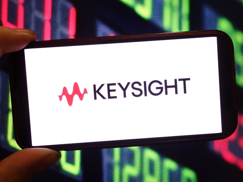 In this photo illustration, the Keysight company logo is seen displayed on a smartphone screen