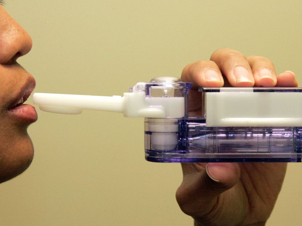 Mannkind Corp and the company's inhalable insulin product. Company employee demonstrating how the device is used. (Photo by Lawrence K. Ho/Los Angeles Times via Getty Images)