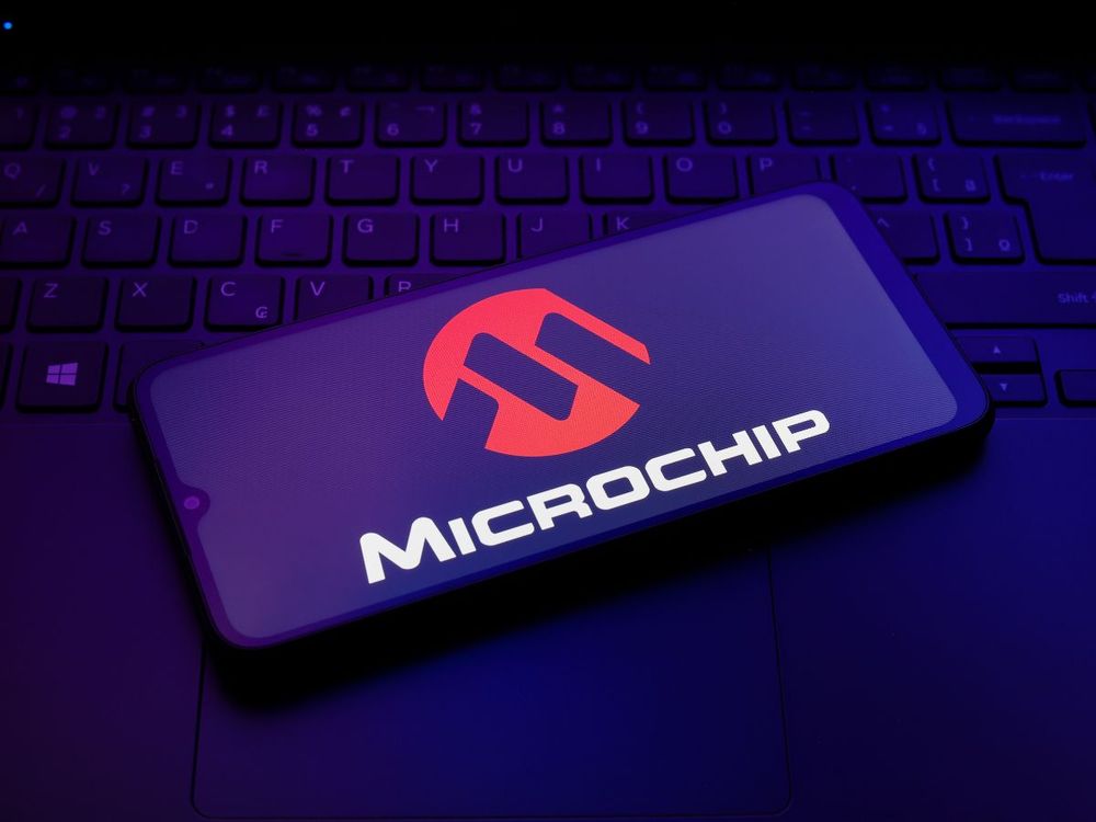 The Microchip Technology logo appears on a smartphone screen in this illustration photo in Reno, United States, on December 17, 2024. (Photo by Jaque Silva/NurPhoto via Getty Images)