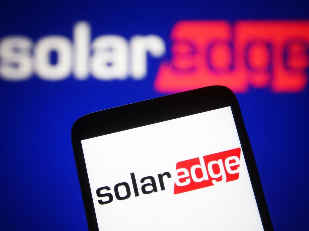 In this photo illustration a SolarEdge Technologies logo is seen on a smartphone